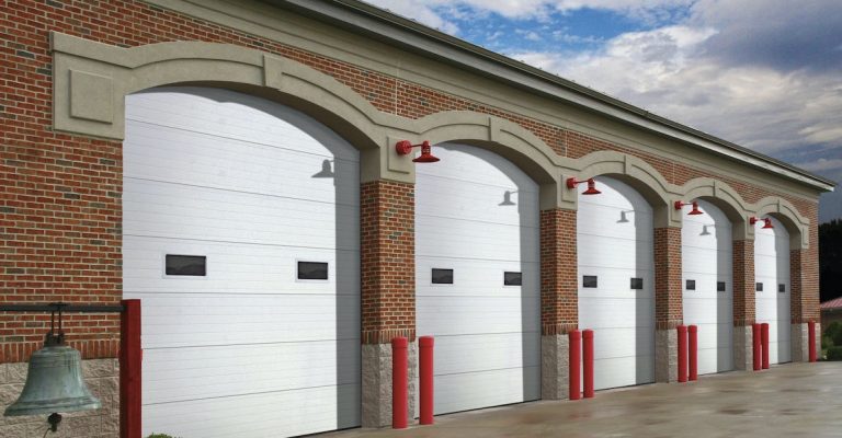 The classic firehouse style but with polyurethane insulated steel sectional doors.